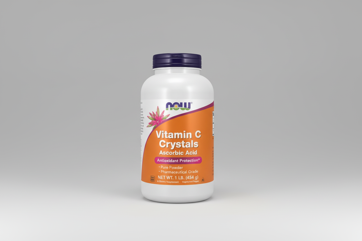 Vitamin C crystals supplement bottle with orange label on a white background