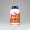 Supplement bottle labeled E-400 with NOW brand on a white background