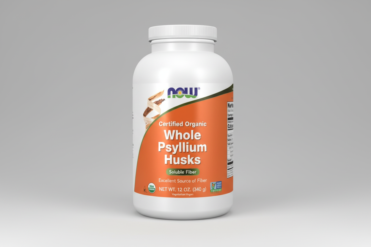 Supplement bottle labeled 'Whole Psyllium Husks' by NOW on an orange background