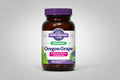 Oregon Grape supplement bottle with purple cap and label on a black background