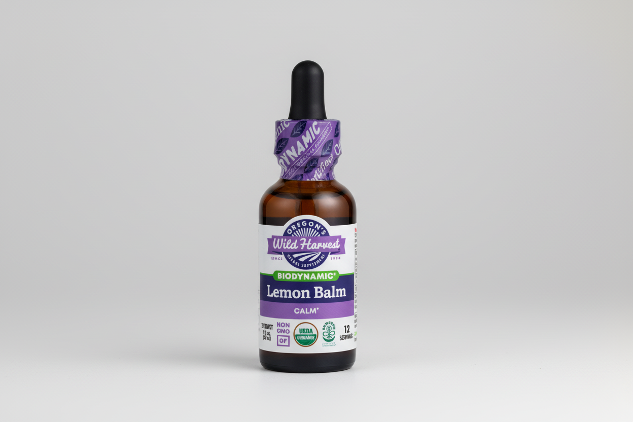 Bottle of Oregon's Wild Harvest Lemon Balm extract with a purple label on a white background