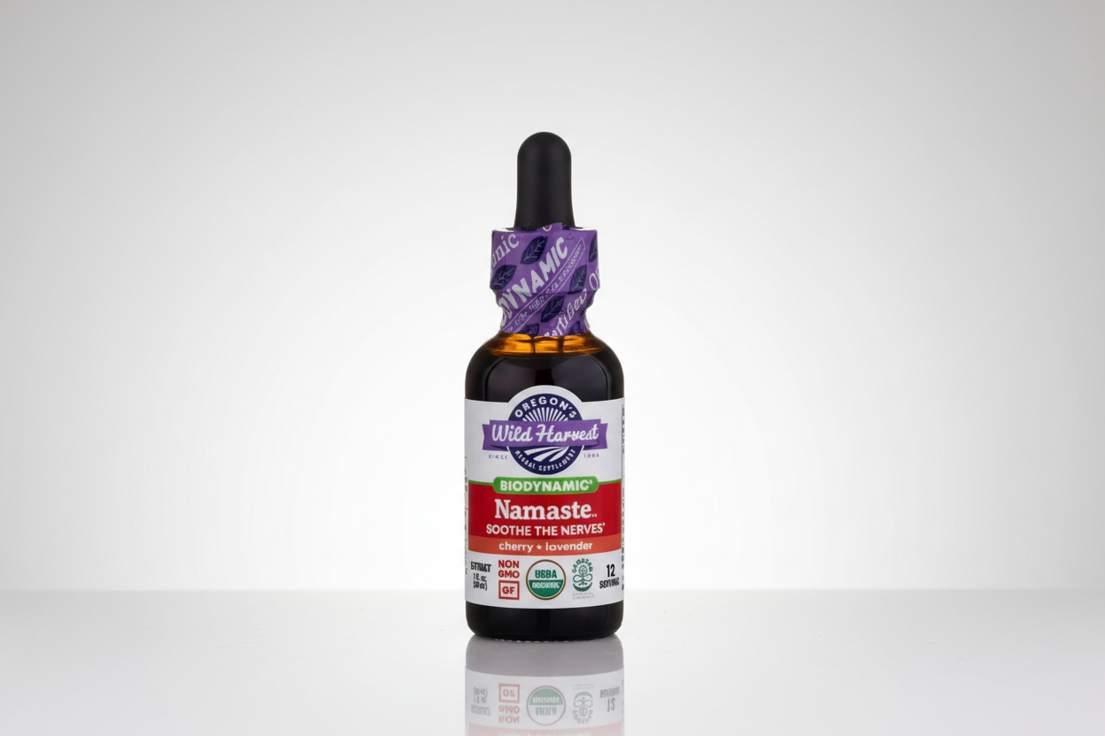 Bottle of Wild Harvest Namaste tincture with a dropper on a white background