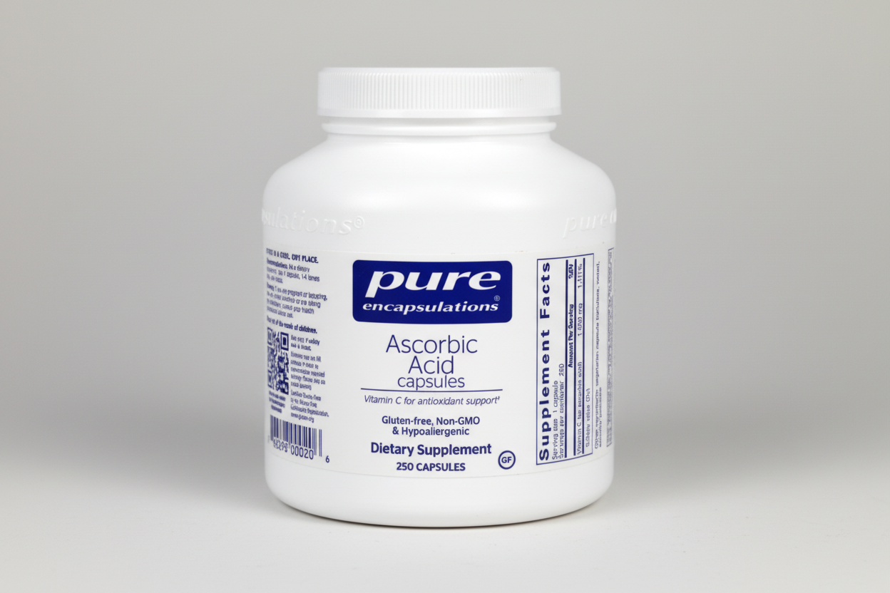 White supplement bottle labeled 'pure encapsulations Ascorbic Acid capsules' on a white background