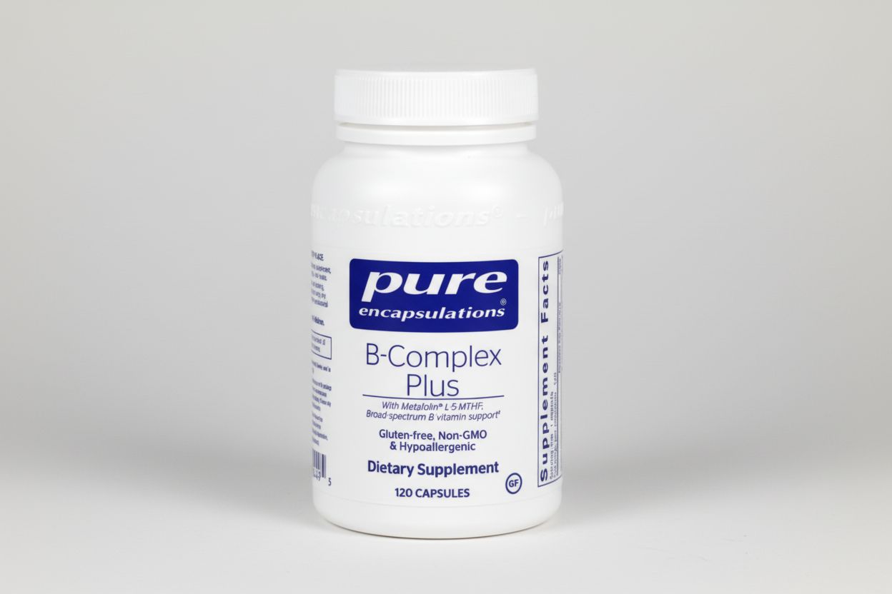White supplement bottle labeled 'pure encapsulations B-Complex Plus' on a white background