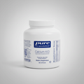 White supplement container labeled 'pure encapsulations Calcium K/D' on a white background