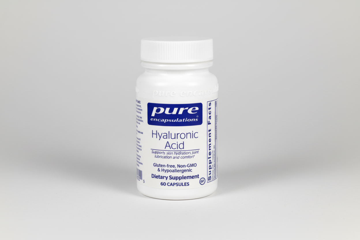 White supplement bottle labeled 'pure encapsulations Hyaluronic Acid' on a white background