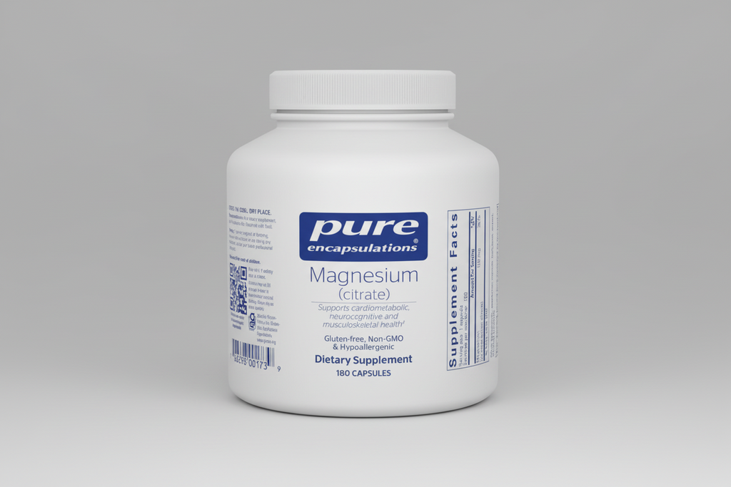 White supplement container labeled 'pure encapsulations Magnesium (citrate)' on a white background