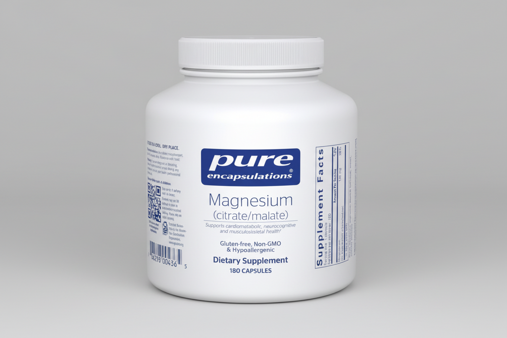 White supplement bottle labeled 'pure encapsulations' with magnesium supplement details on a white background