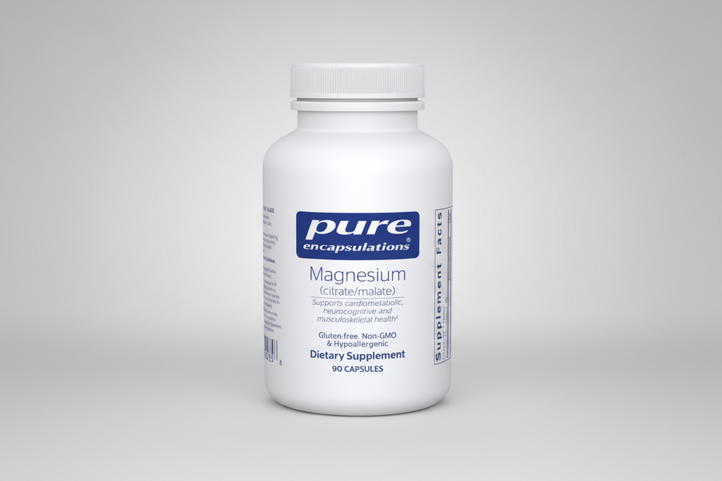 White supplement bottle labeled 'pure encapsulations Magnesium' on a white background
