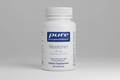 White bottle of pure encapsulations Melatonin 20 mg dietary supplement on a white background