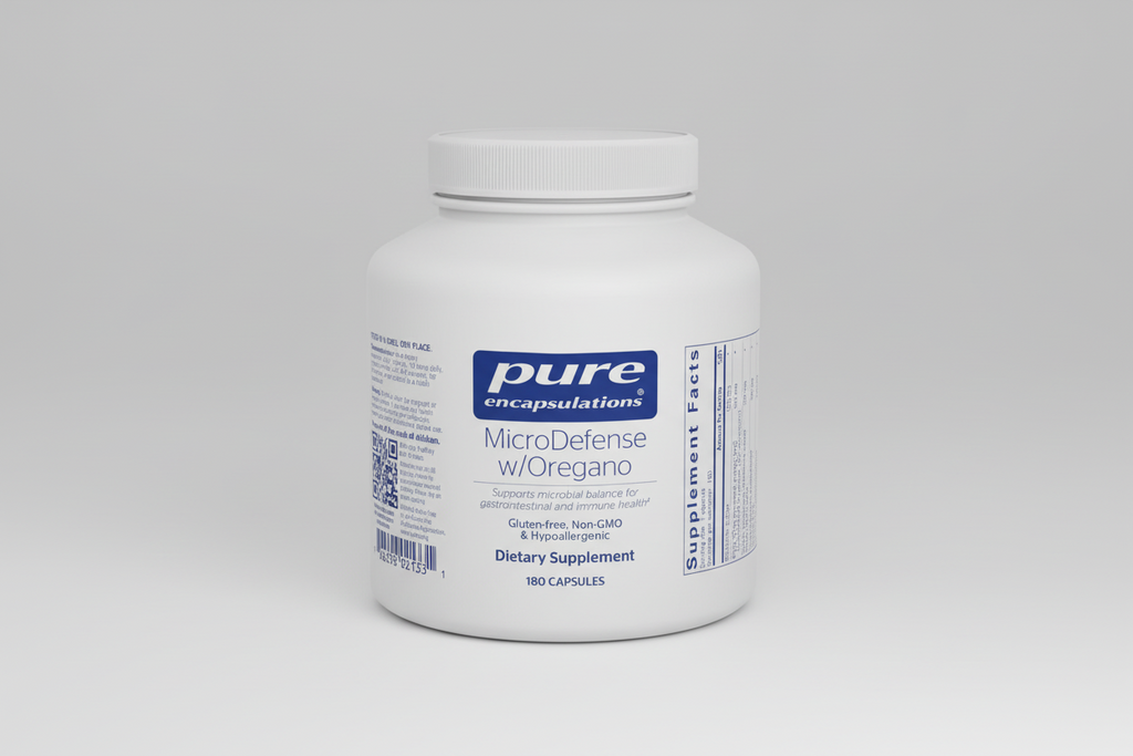 White supplement bottle labeled 'pure encapsulations MicroDefense w/Oregano' on a white background