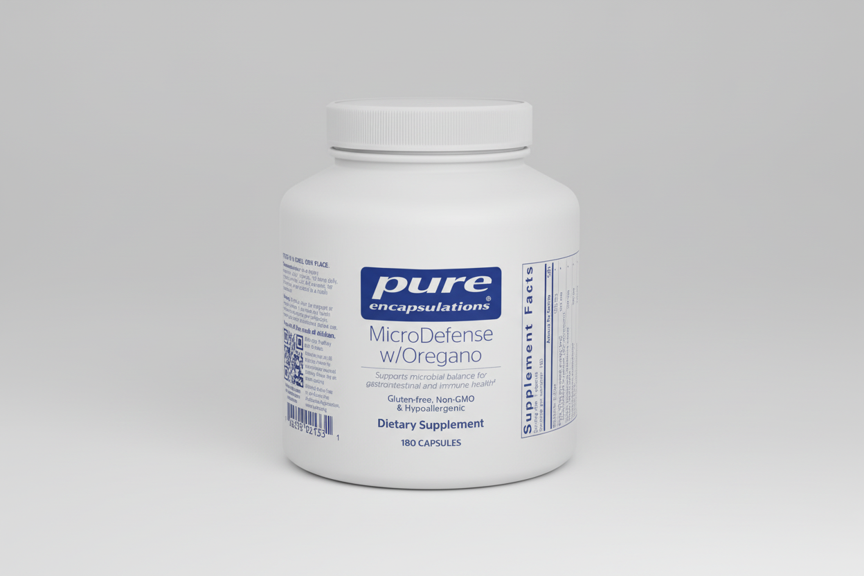 White supplement bottle labeled 'pure encapsulations MicroDefense w/Oregano' on a white background
