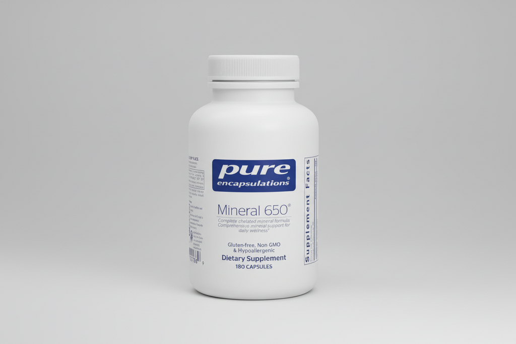 White supplement bottle labeled 'pure encapsulations Mineral 650' on a white background