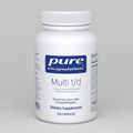 White bottle of pure encapsulations Multi t/d dietary supplement on a white background