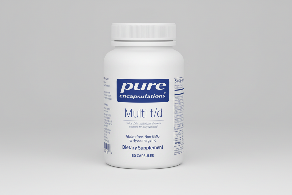 White supplement bottle labeled 'pure encapsulations Multi t/d' on a white background