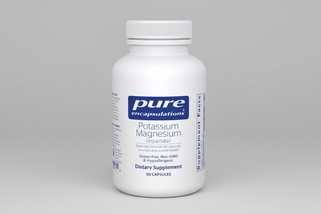 White supplement bottle labeled 'pure encapsulations Potassium Magnesium' on a white background