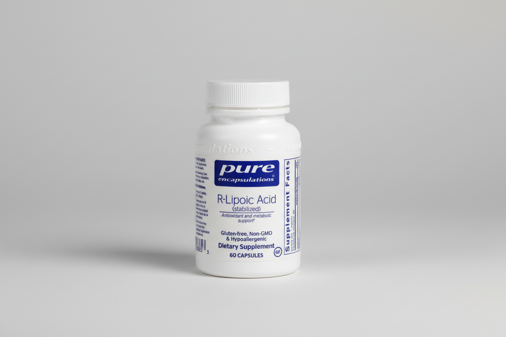 Supplement bottle labeled 'pure encapsulations R-Lipoic Acid' on a white background