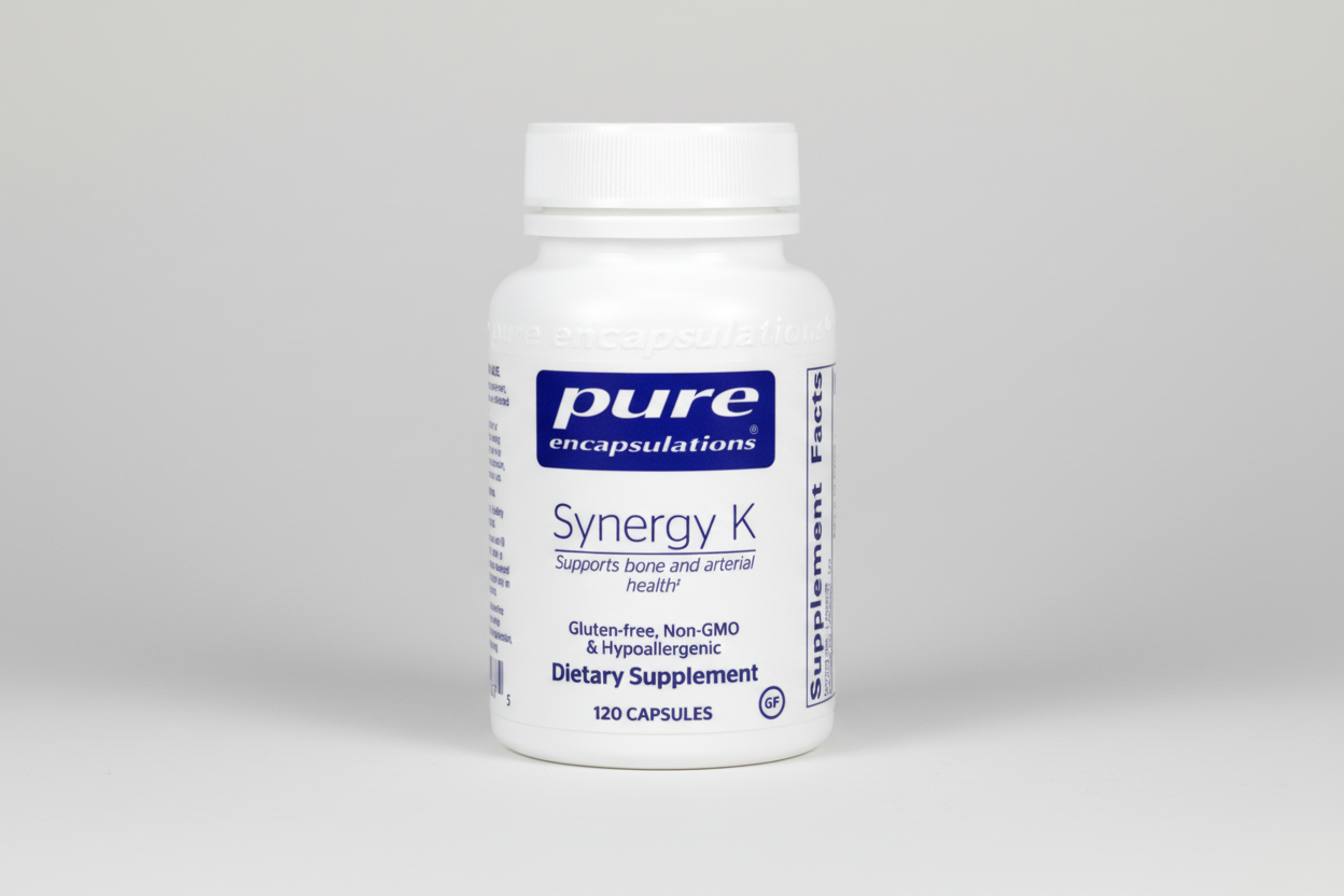 Supplement bottle labeled 'Synergy K' by pure encapsulations on a white background