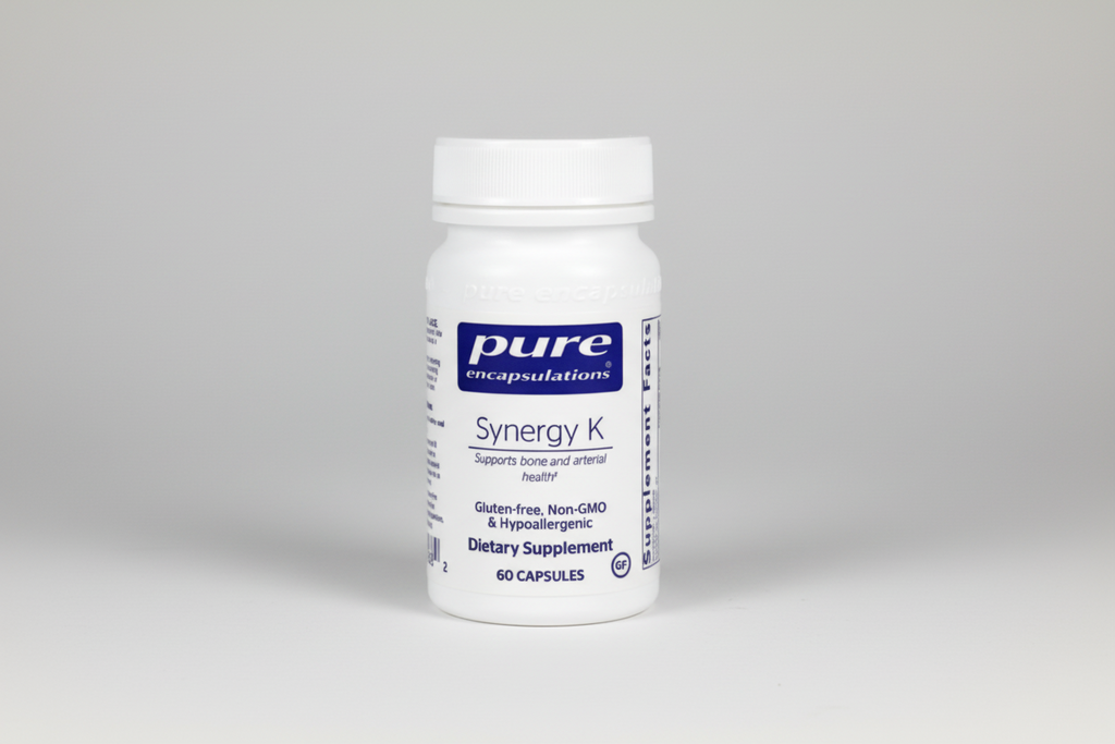 Supplement bottle labeled 'Synergy K' by Pure Encapsulations on a white background