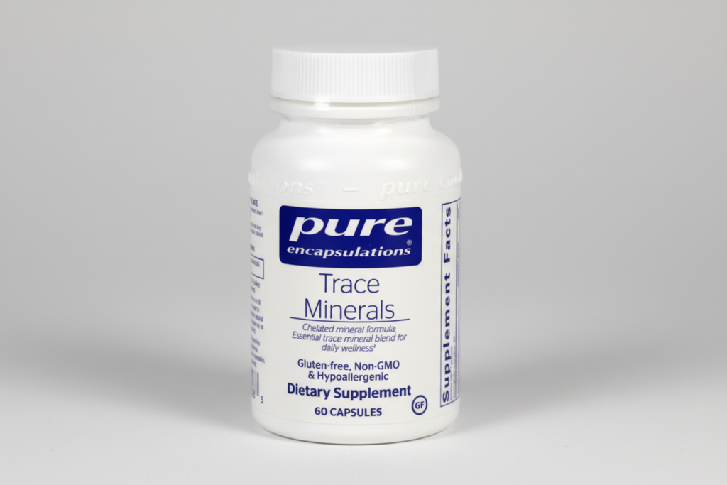 Supplement bottle labeled 'pure encapsulations Trace Minerals' on a white background