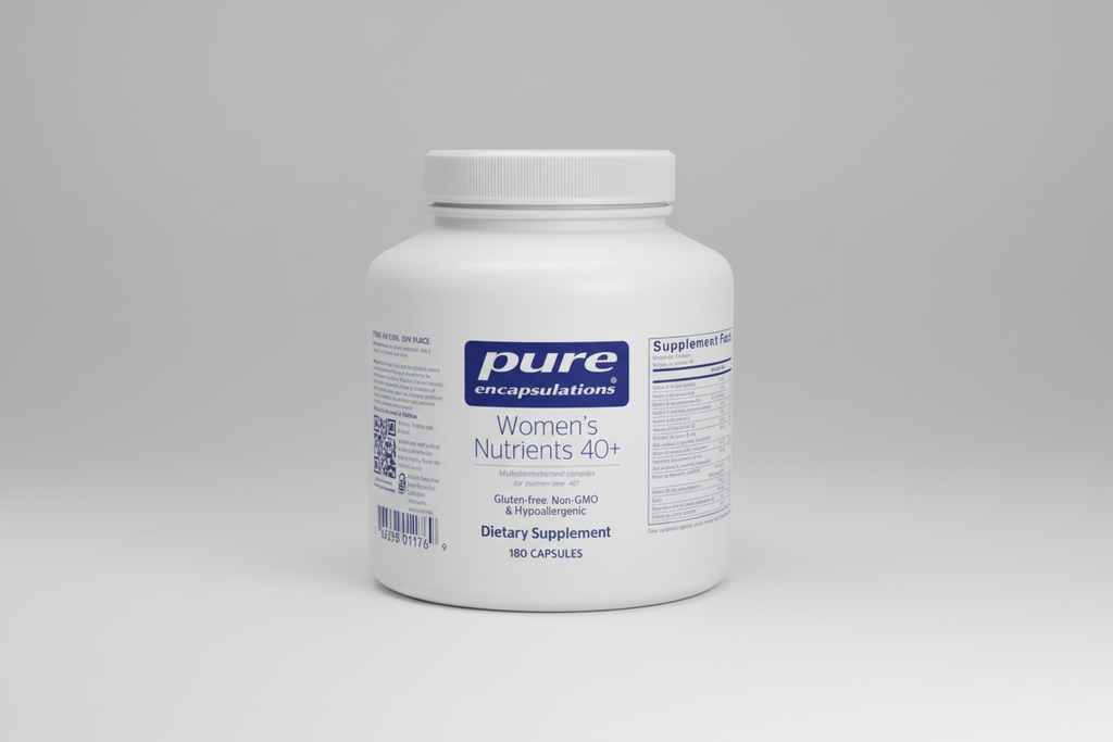White supplement container labeled 'pure encapsulations Women's Nutrients 40+' on a white background