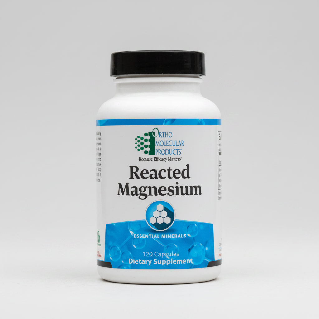 Supplement bottle labeled 'Reacted Magnesium' by Ortho Molecular Products on a white background