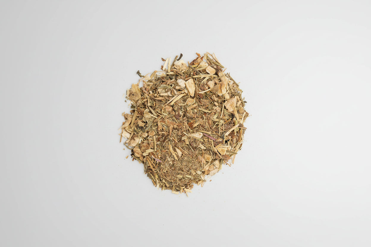 Heap of dried herbs on a white background
