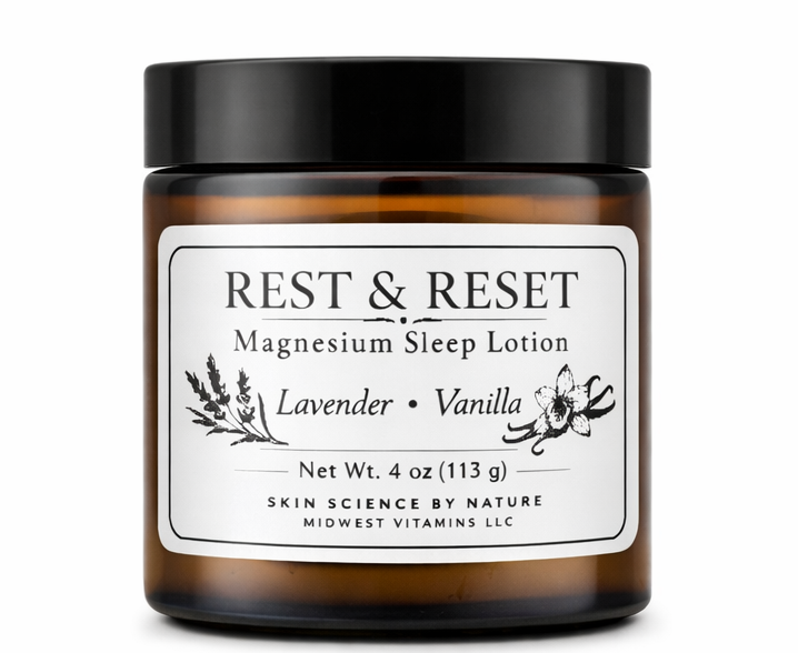 Jar of Rest & Reset magnesium sleep lotion with a black lid on a white background