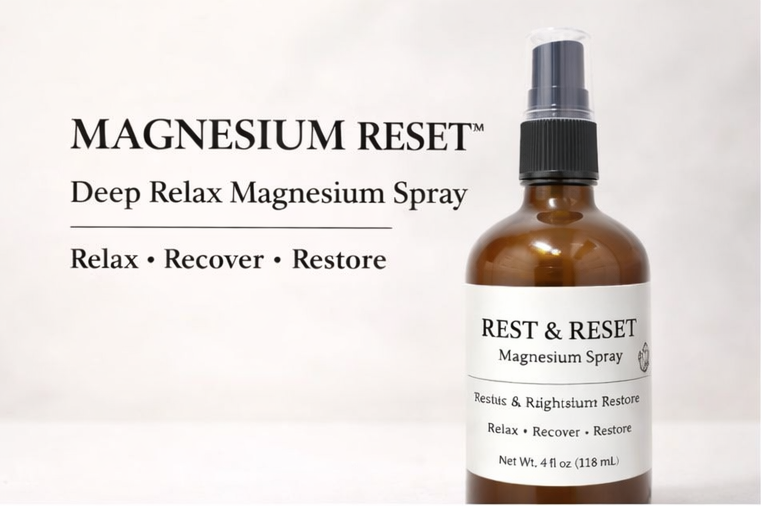 Brown spray bottle labeled 'Magnesium Reset' on a white background