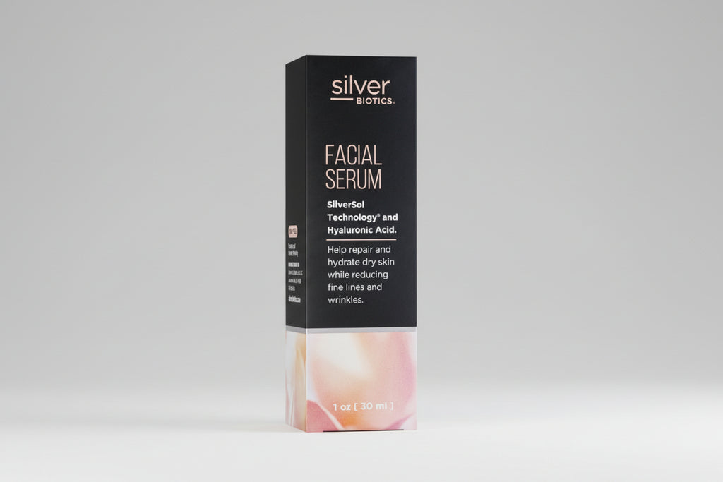 Box of Silver Biotics Facial Serum with black background and product details.