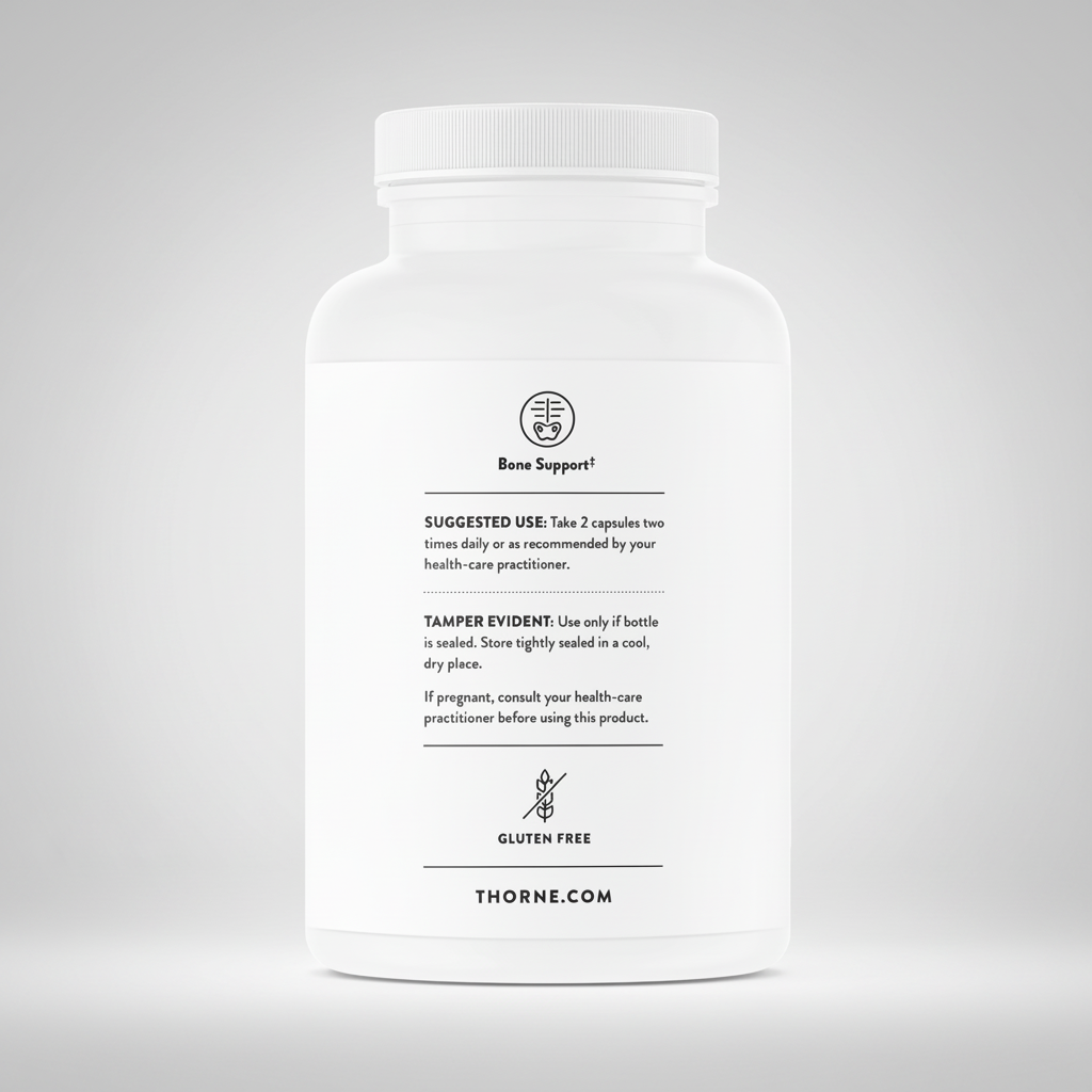 White supplement bottle with black text on a white background