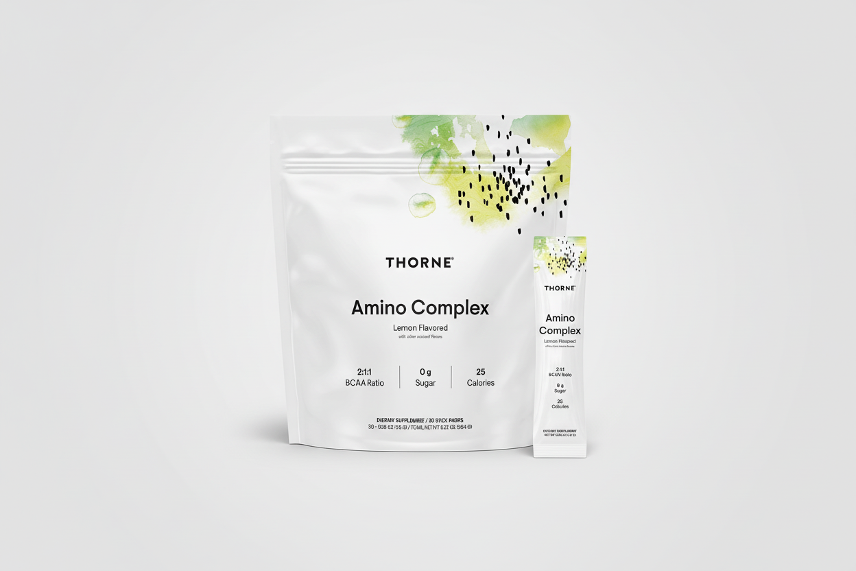 Thorne Amino Complex supplement package with lemon flavor on a black background