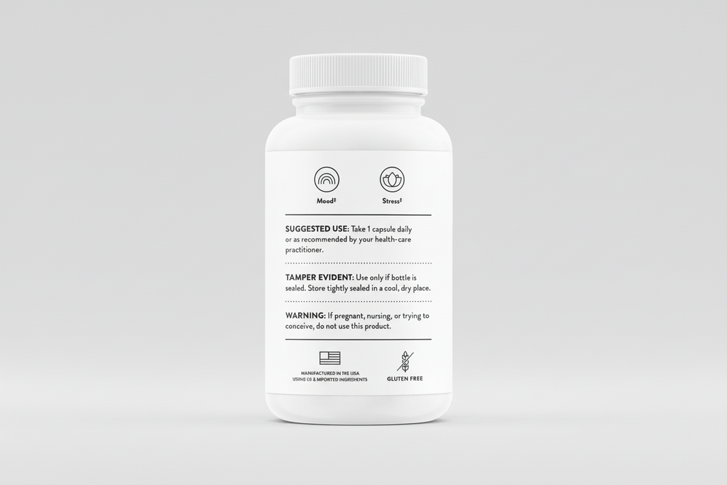 White supplement bottle with label on a black background