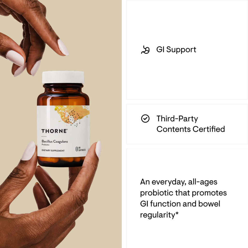 Thorne supplement bottle held by a hand with product details on a beige background