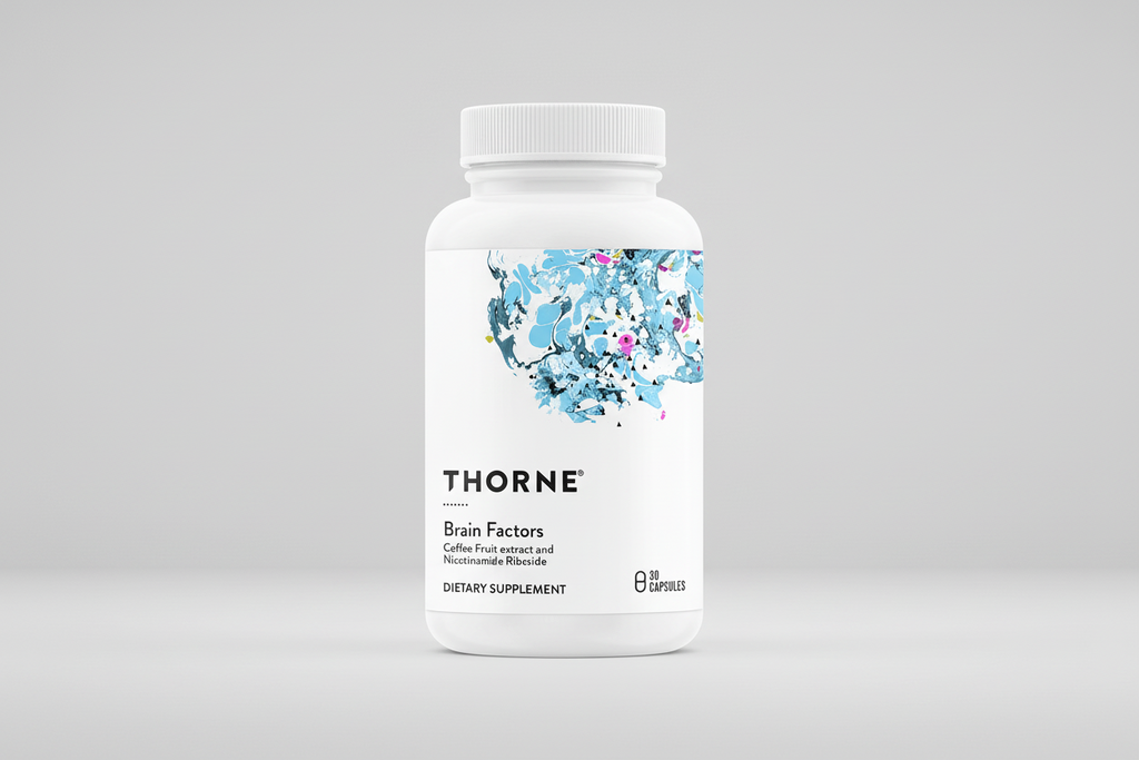 Thorne Brain Factors dietary supplement bottle on a black background