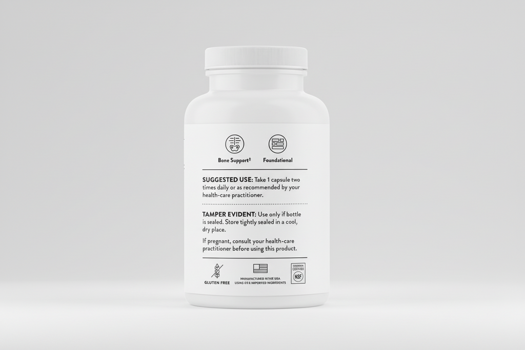 White supplement bottle with label on a black background