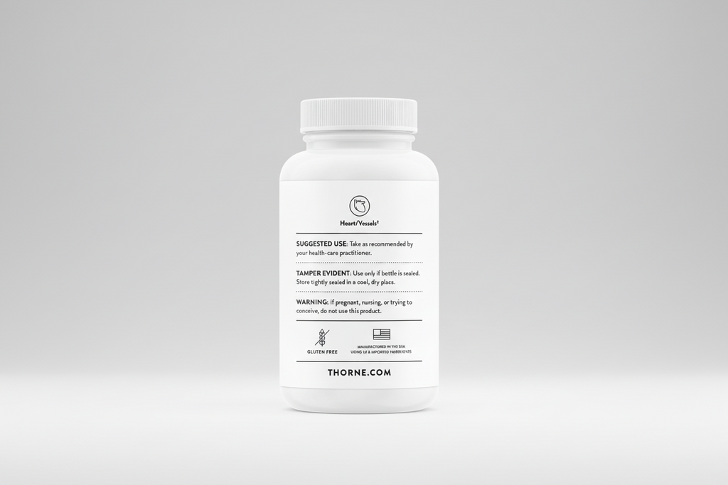 White supplement bottle with label on a black background