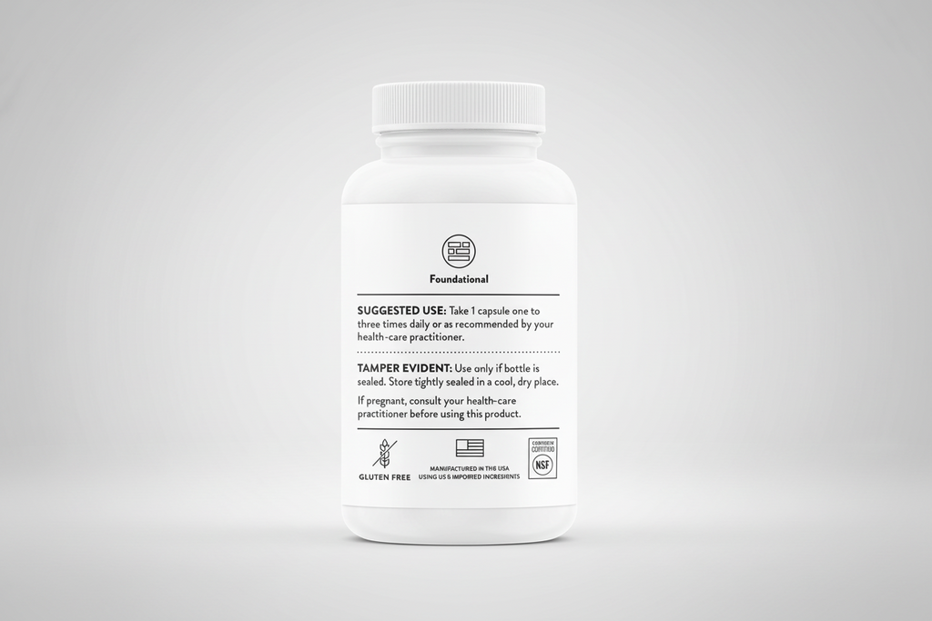 White supplement bottle with label on a black background