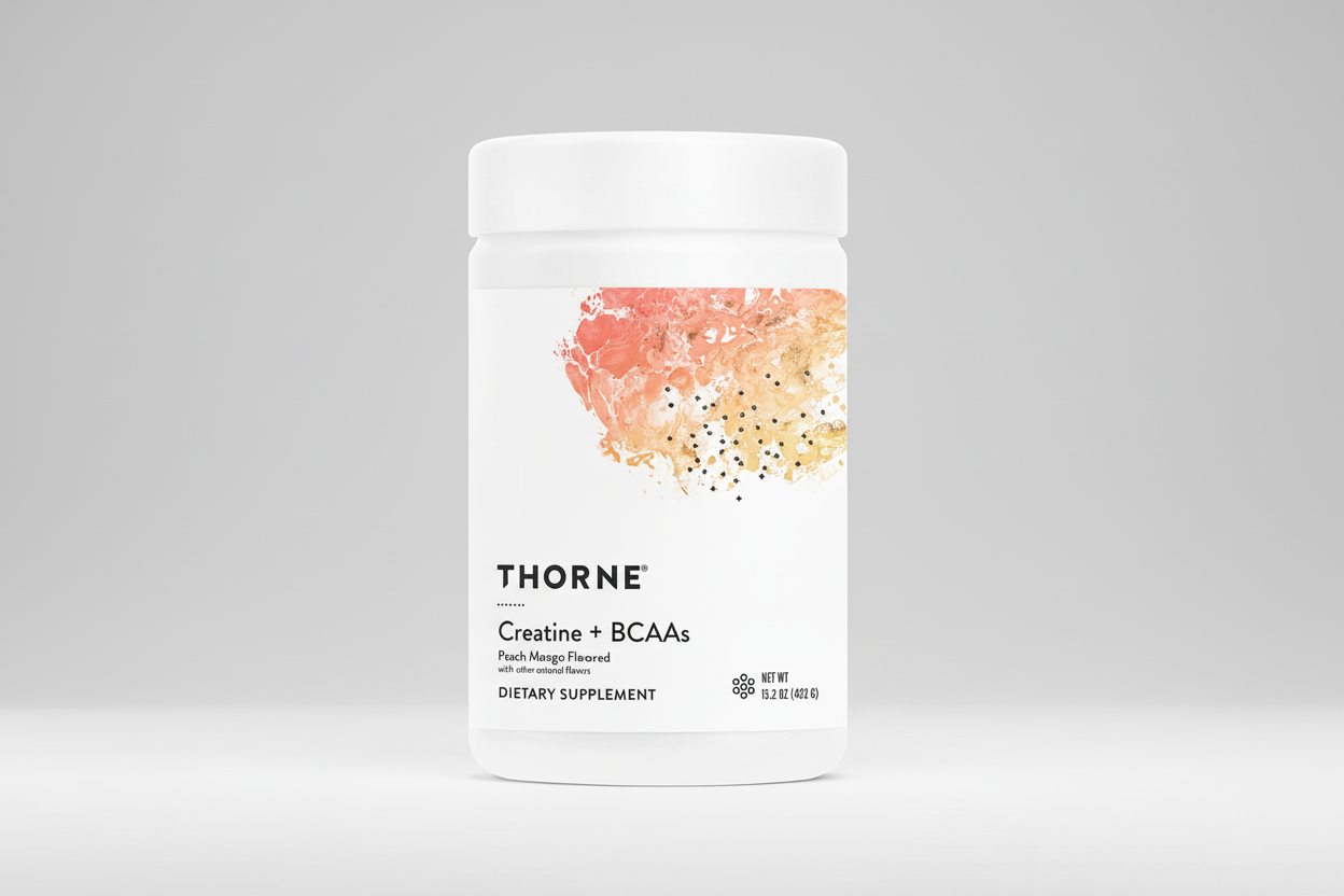Thorne Creatine + BCAAs dietary supplement container with peach mango flavor on a white background