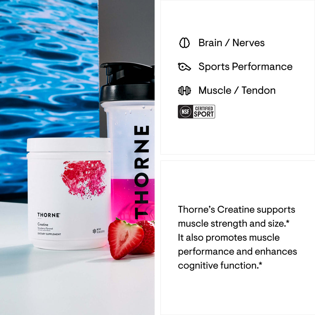 Thorne Creatine supplement containers with a strawberry on a white surface, featuring NSF Sport certification.