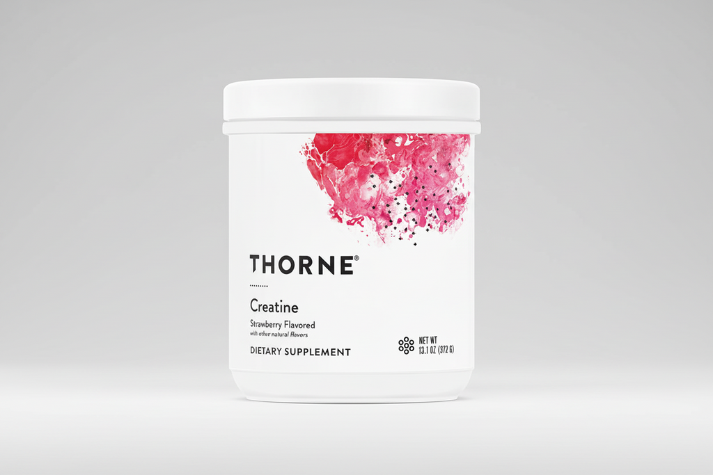 Thorne Creatine supplement container with pink design on a white background