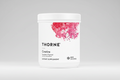 Thorne Creatine supplement container with pink design on a white background