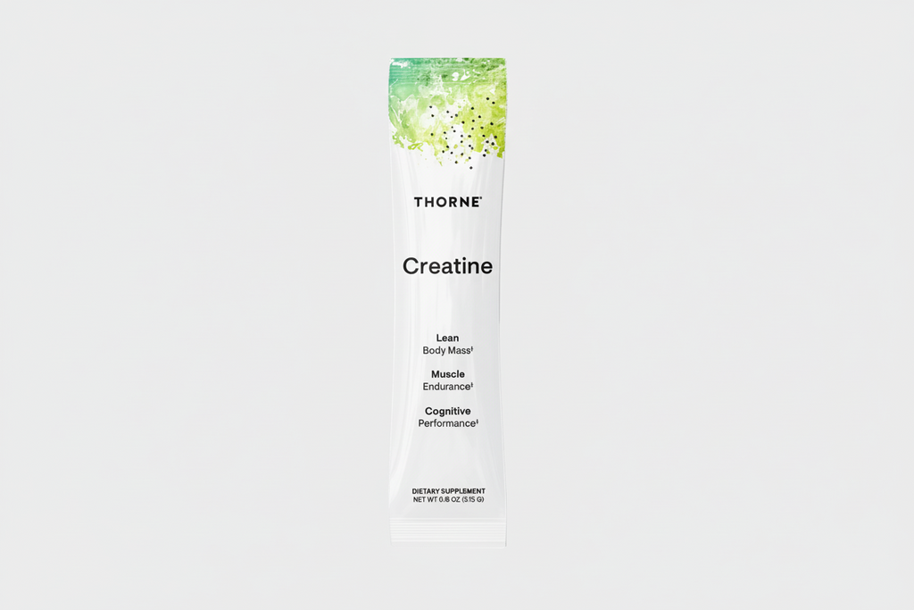 Thorne Creatine supplement package on a black background