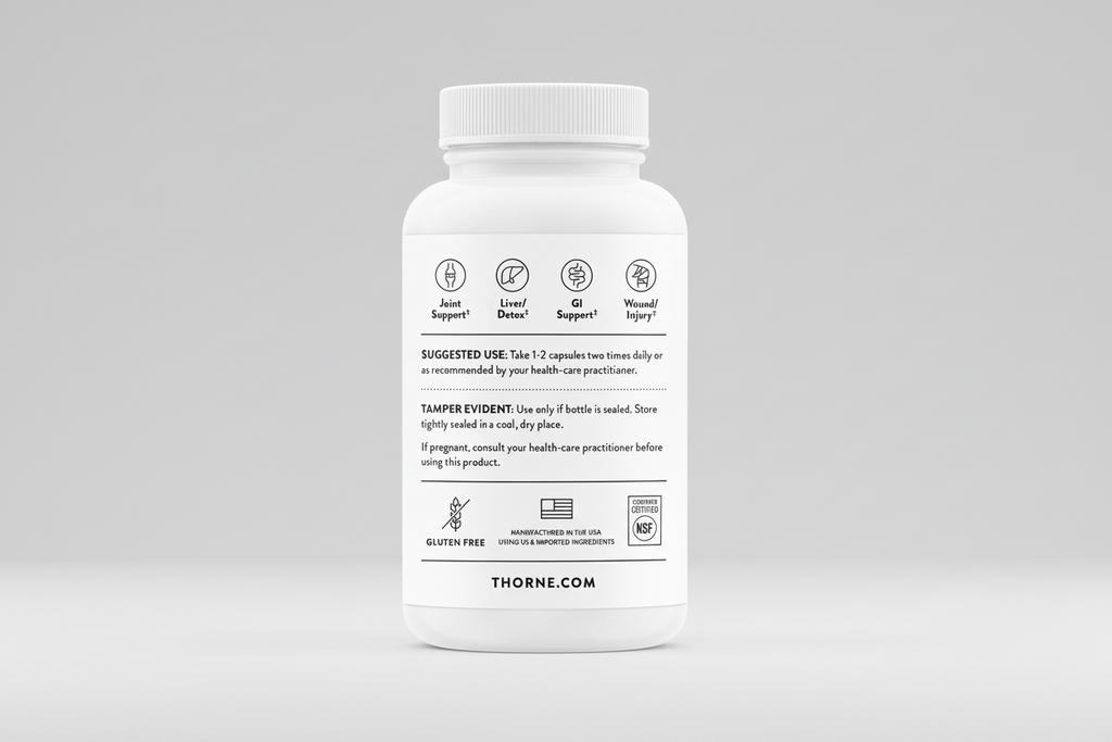 White supplement bottle with label on a black background
