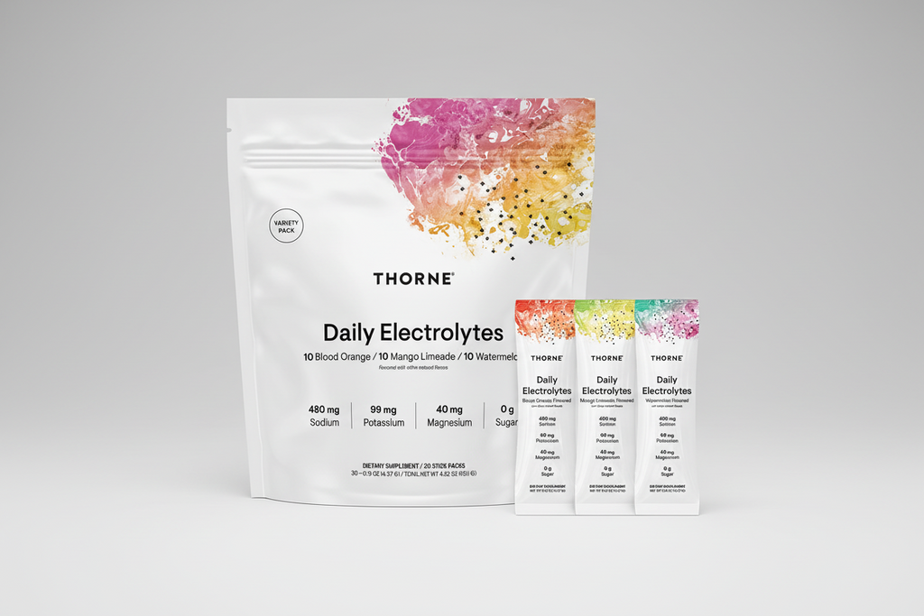 Thorne Daily Electrolytes packaging with colorful design on a black background