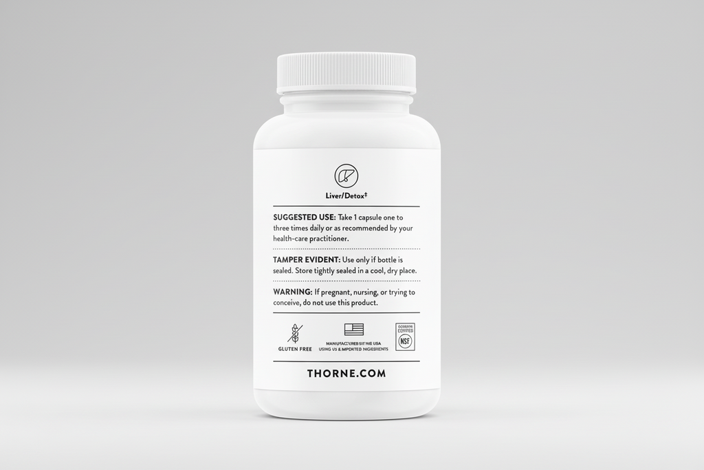 White supplement bottle with label on a black background