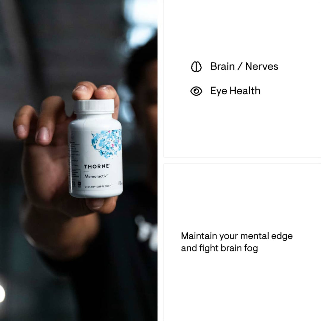 Hand holding a Thorne supplement bottle with product details on a blurred background