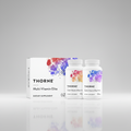 Thorne Multi-Vitamin Elite dietary supplements with colorful label design on a white background