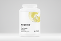 Thorne Plant Protein container with a vanilla flavor label on a white background