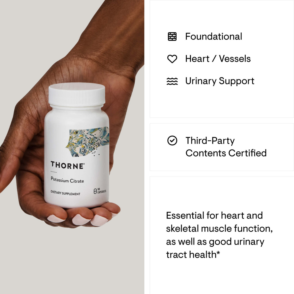 Hand holding a Thorne supplement bottle with product details on the right